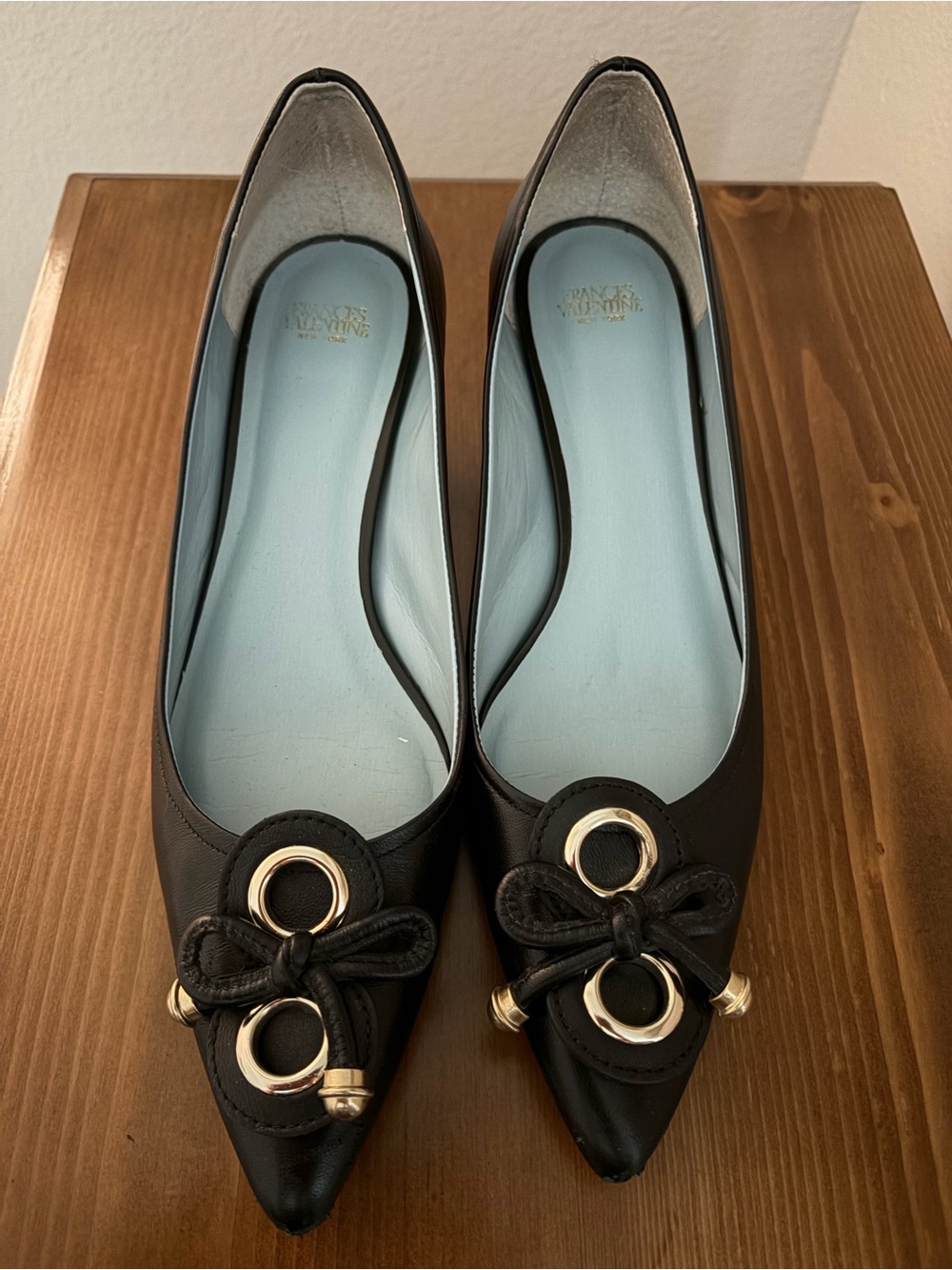 Frances Valentine black leather kitten heels with gold hardware